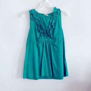 Sleeveless green top